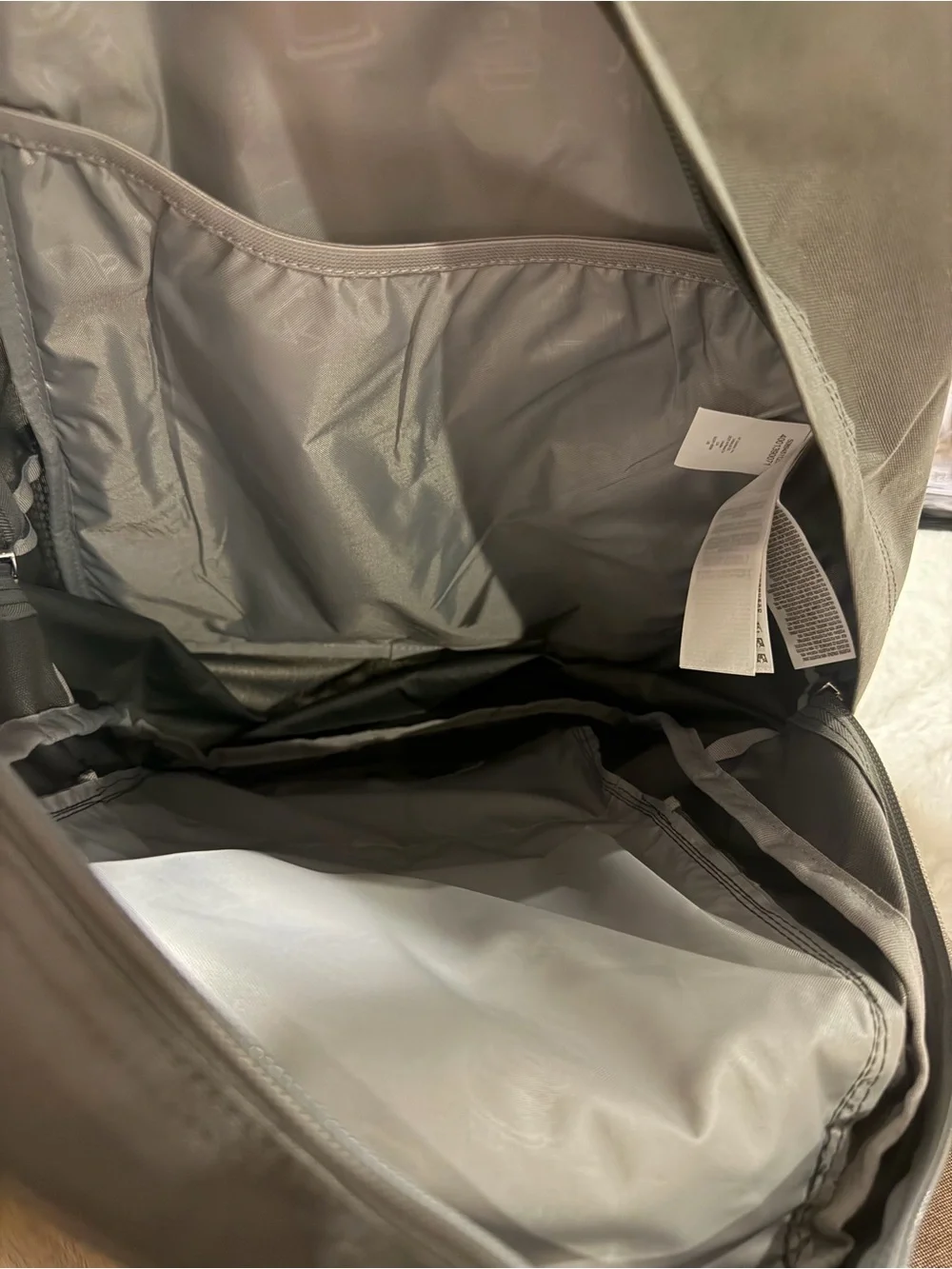 Jansport Gray Backpack with Front Pocket and Logo Patch